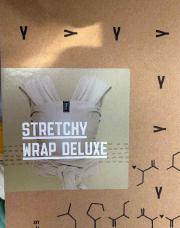 Stretchy beige porte bébé 
