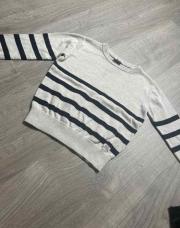 Pull tape à l’œil gris 104 cm 