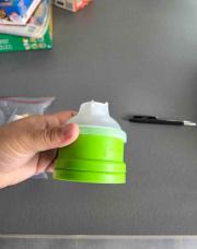 Doseur de lait vert 