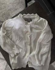 Gilet blanc avec bouton à coeur