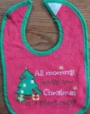 Bavoir de Noël rouge bord vert all monny wants for christmas IS a silent night scratch 