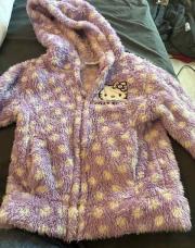 Gilet doux et Hello Kitty, quatre ans