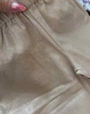 Pantalon doré jamais porté 2 ans 