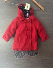 Veste orchestra taille 6 mois rouge avec des noeux
