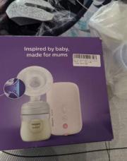 Tire lait Philips + accessoires 