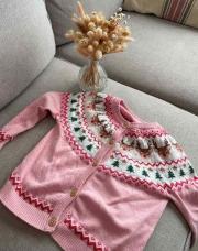 Cardigan Noël rose 3/4A Primark 