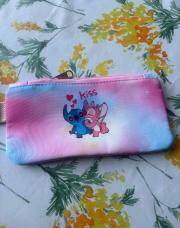 Nouveau plumier rose avec du bleu 