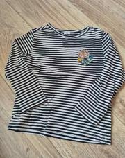 Pull longue manche ligne avec fleur brodee