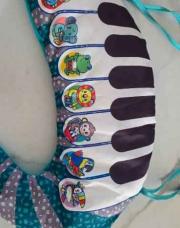 Piano éveil bébé à accrocher 