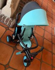 Pousse vélo bleu noir 