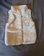 Gilet sans manche moumoute 92 cm