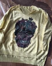 Pull jaune tête de mort
