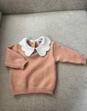 Pull rose à col blanc 