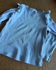 Blouse bleu à volant 