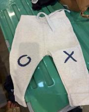 Jogging gris 6 mois « O » « X »