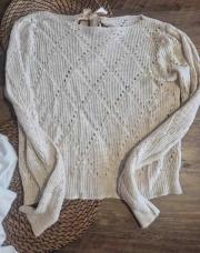Pull en laine nœud au dos tu