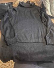 Pull noir col roulé tu