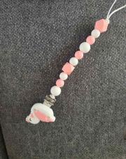 Attache tétine rose 