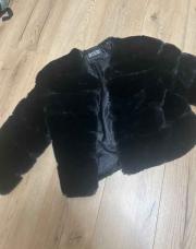 Manteau fourrure court (jamais porté) s/m