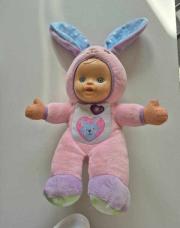 Peluche bébé chantant
