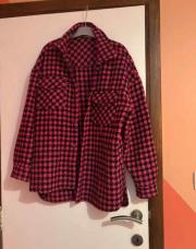 Sur chemise à carreaux rose et noir taille M