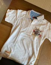 Polo blanc neuf 8 ans 