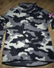 Pull noir et blanc 10 ans neuf 