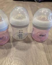 3 petits biberons 