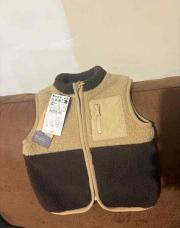 Gilet neuf 6 mois kiabi 