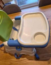 N. Rehausseur chaise Fisher Price