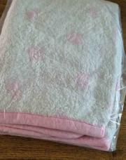 Couverture blanche et rose 