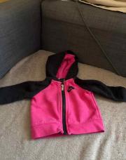 Gilets Nike rose et noir 6 mois 